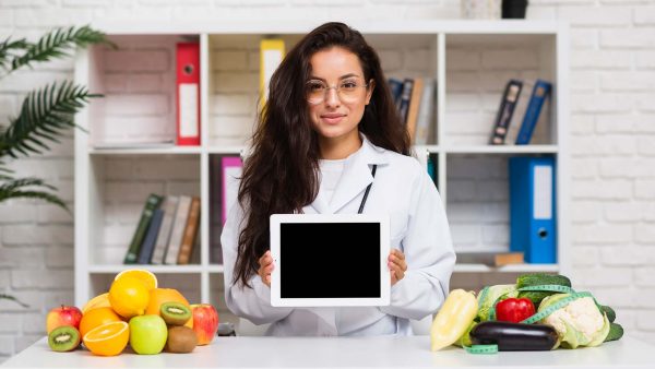 medium-shot-young-doctor-with-tablet-mock-up